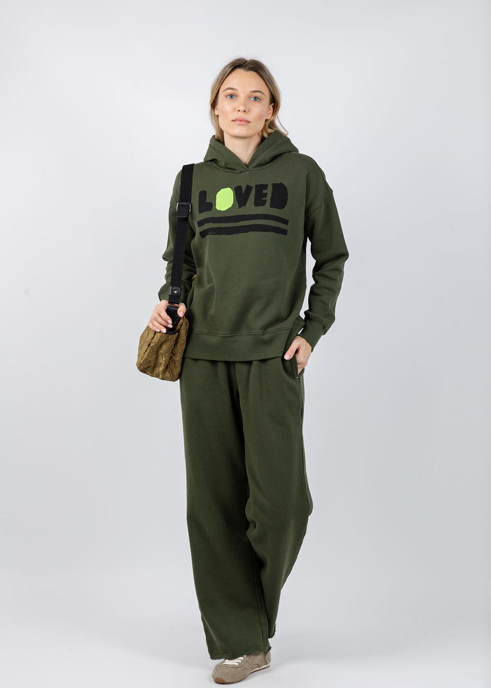 Kerri Rosenthal Boyfriend Loved Hoodie in Pine Green paired with matching Weekend Barb Sweatpants in Pine Green available at Barbara Katz