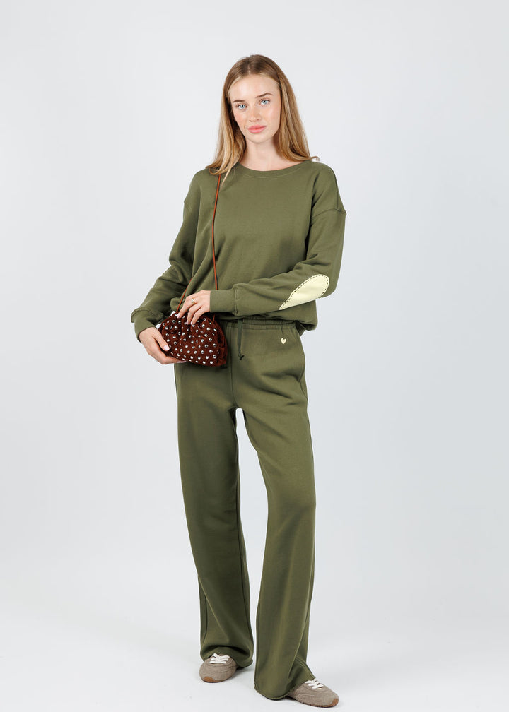 Kerri Rosenthal Ex-Boyfriend Sweatshirt in Army Green paired with Kerri Rosenthal Weekend Barb Sweatpants in Army Green available at Barbara Katz