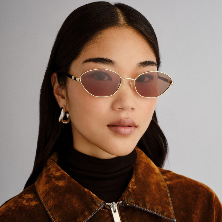 Le Specs Le Bebe Sunglasses in Gold available at Barbara Katz