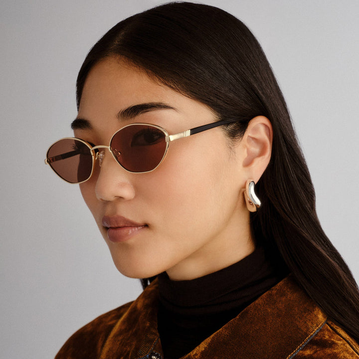 Le Specs Le Bebe Sunglasses in Gold available at Barbara Katz