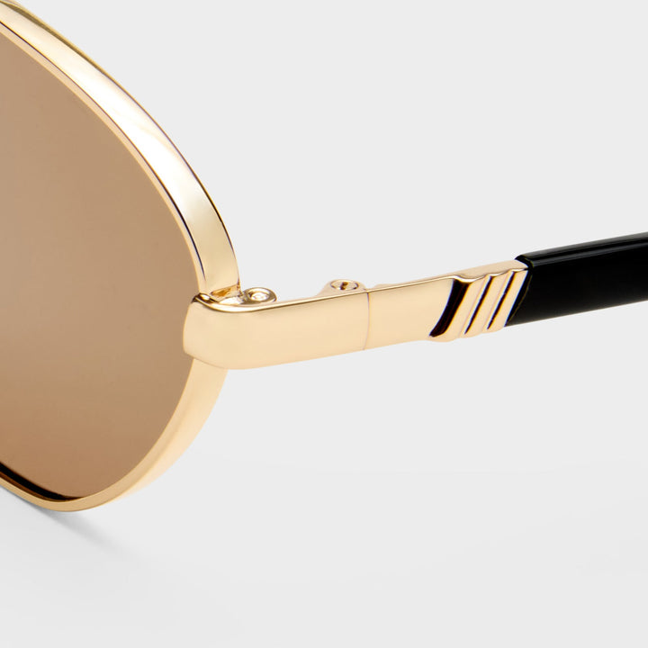 Le Specs Le Bebe Sunglasses in Gold available at Barbara Katz