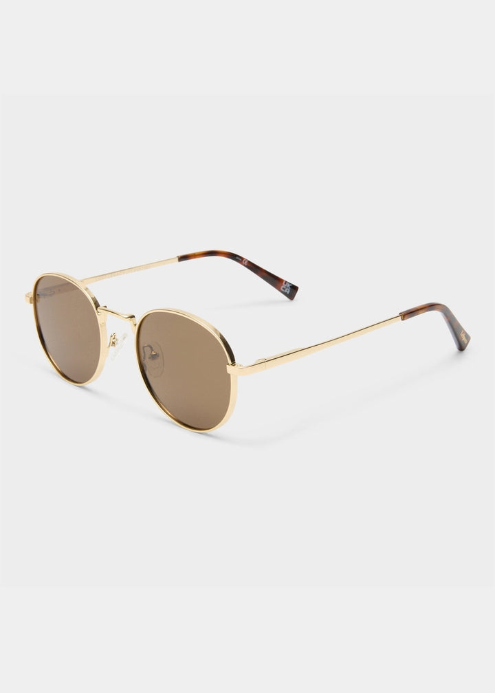 Le Specs Lost Legacy Sunglasses in Gold available at Barbara Katz