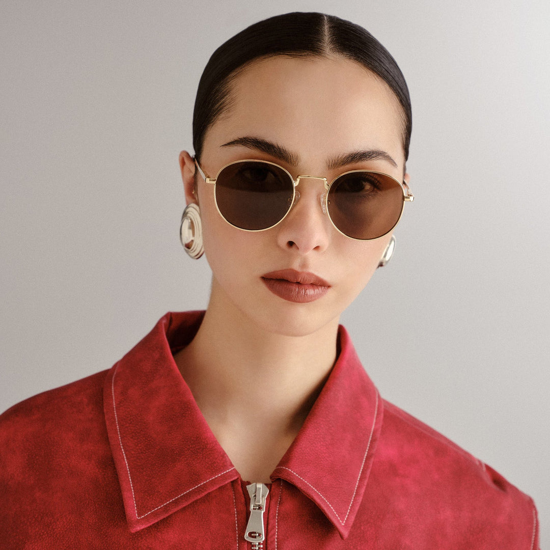 Le Specs Lost Legacy Sunglasses in Gold available at Barbara Katz