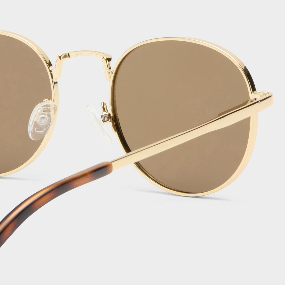 Le Specs Lost Legacy Sunglasses in Gold available at Barbara Katz