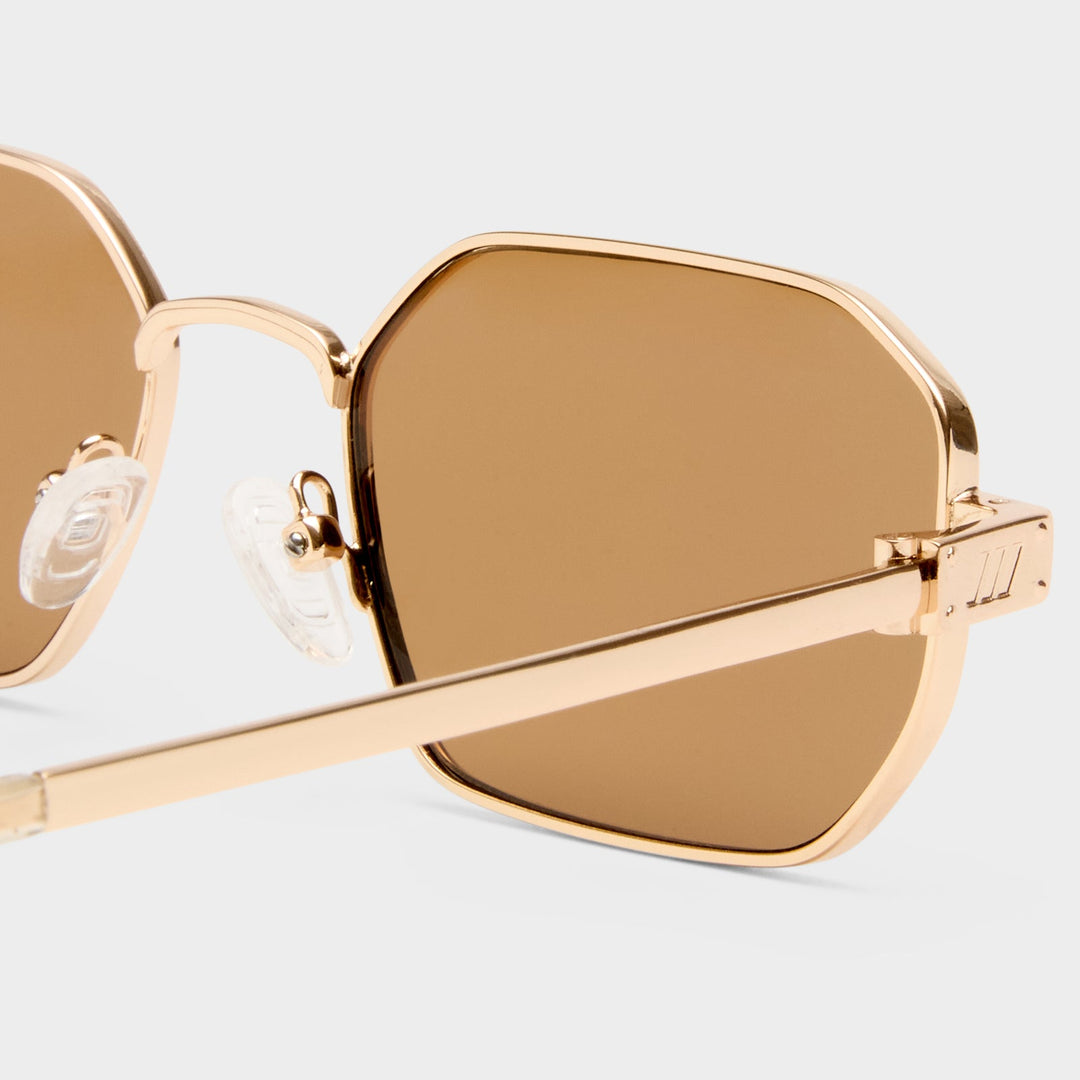 Le Specs Mythic Sunglasses in Gold available at Barbara Katz