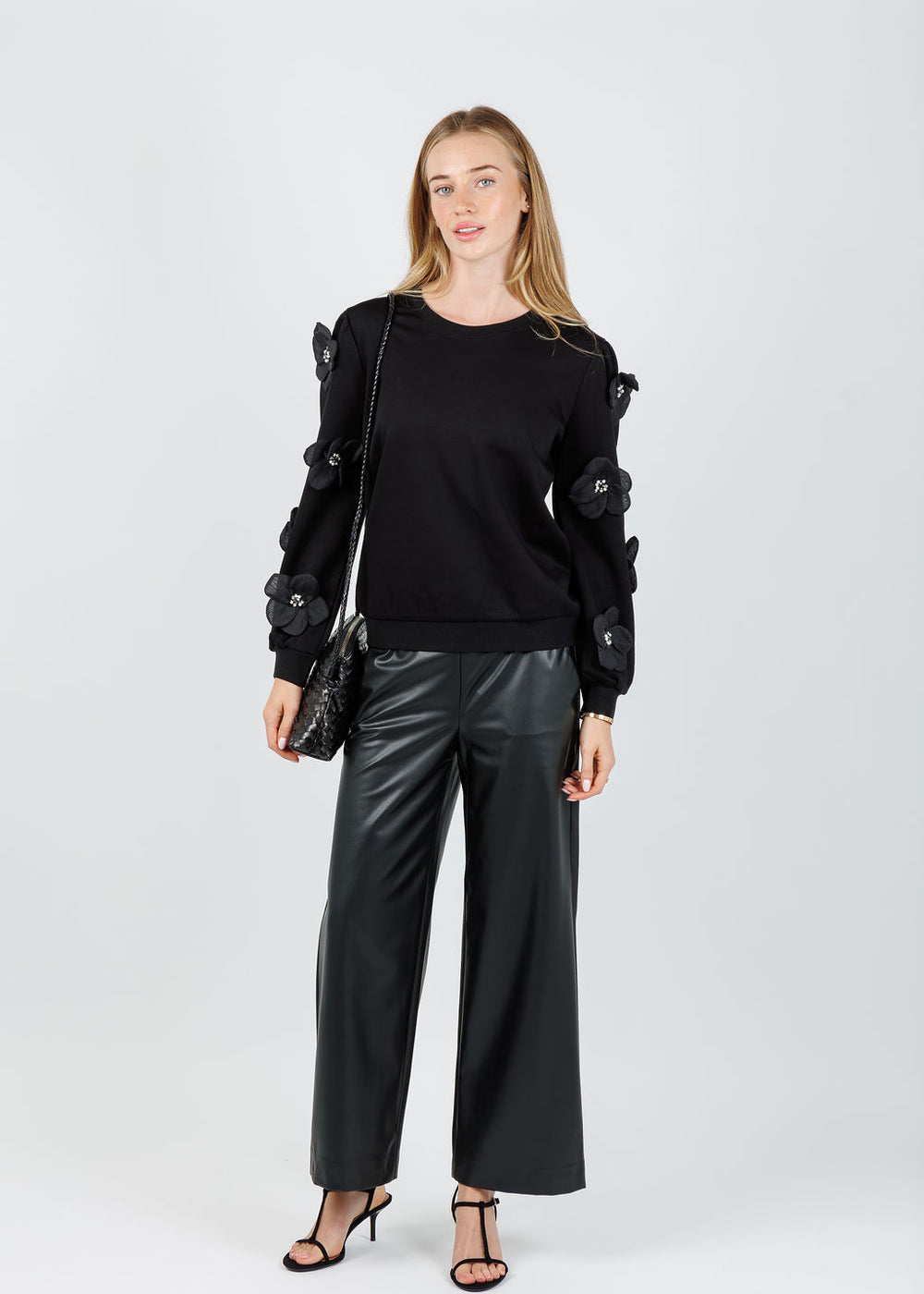 Leo & Ugo Alizee Floral 3D Sleeve Sweatshirt in Black paired with Raffaello Rossi Palina Vegan Leather Pants in Black available at Barbara Katz