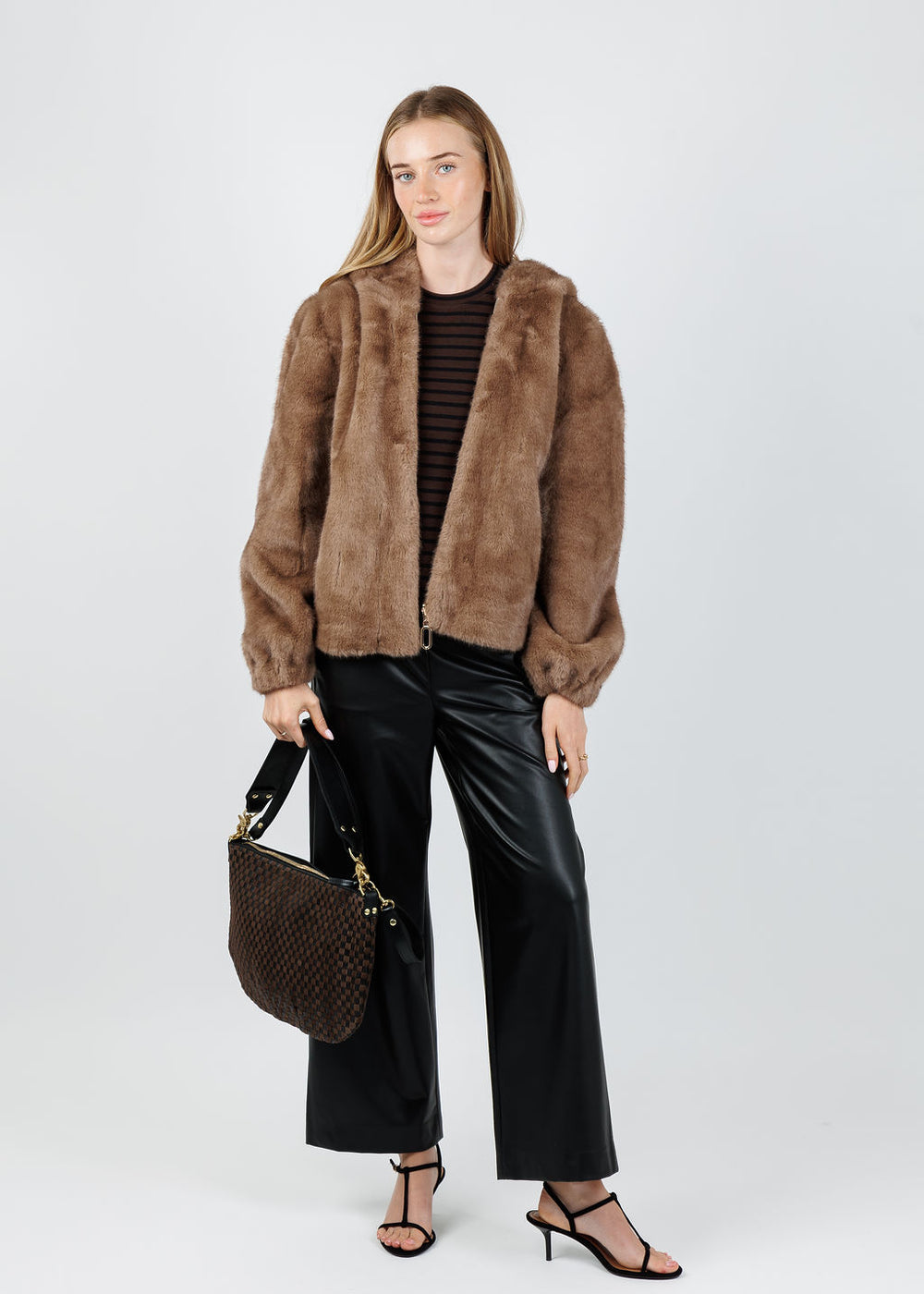 Leo & Ugo Faux Fur Zip Jacket in Camel  paired with Raffaello Rossi Palina Vegan Leather Culotte Pants in Black available at Barbara Katz