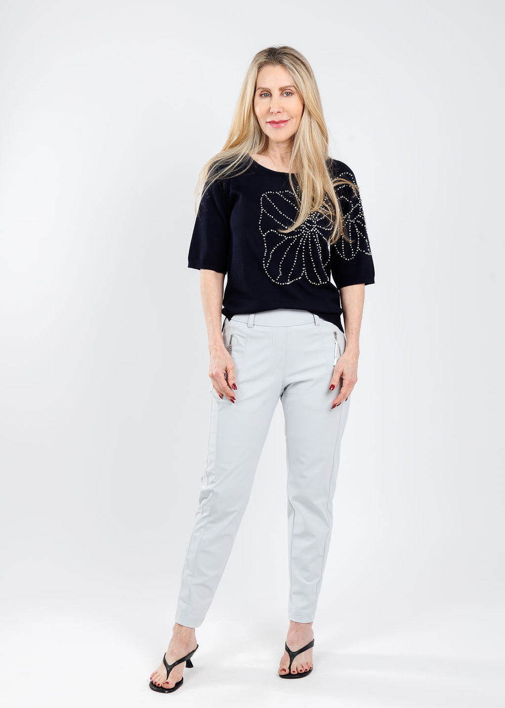 Leo & Ugo Jean Pearl Embellished Top in Navy paired with Raffaello Rossi Natina Sport Pants in Light Grey available at Barbara Katz