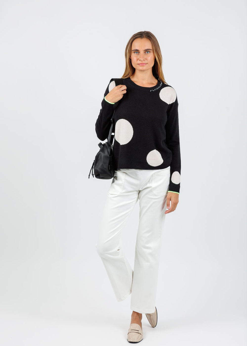 Lisa Todd Hot For Dots Sweater in Black paired with Elliott Lauren Twill Patch Pocket Jean in Cream available at Barbara Katz