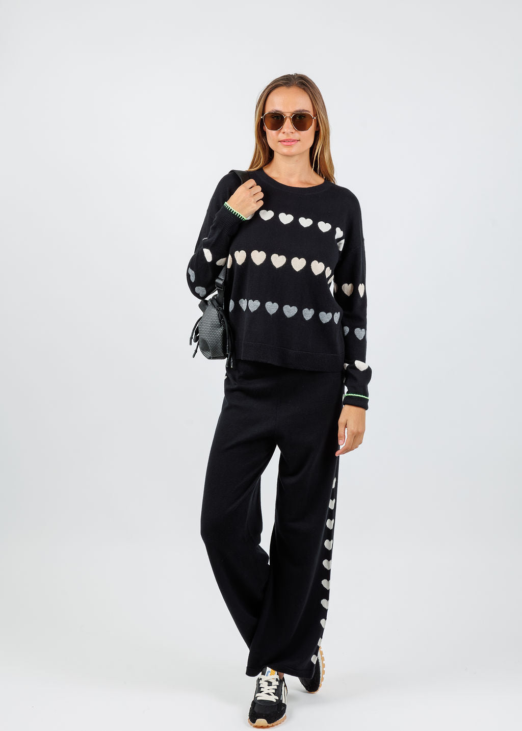 Lisa Todd Love Track Sweater paired with Love Track Pants in Black available at Barbara Katz