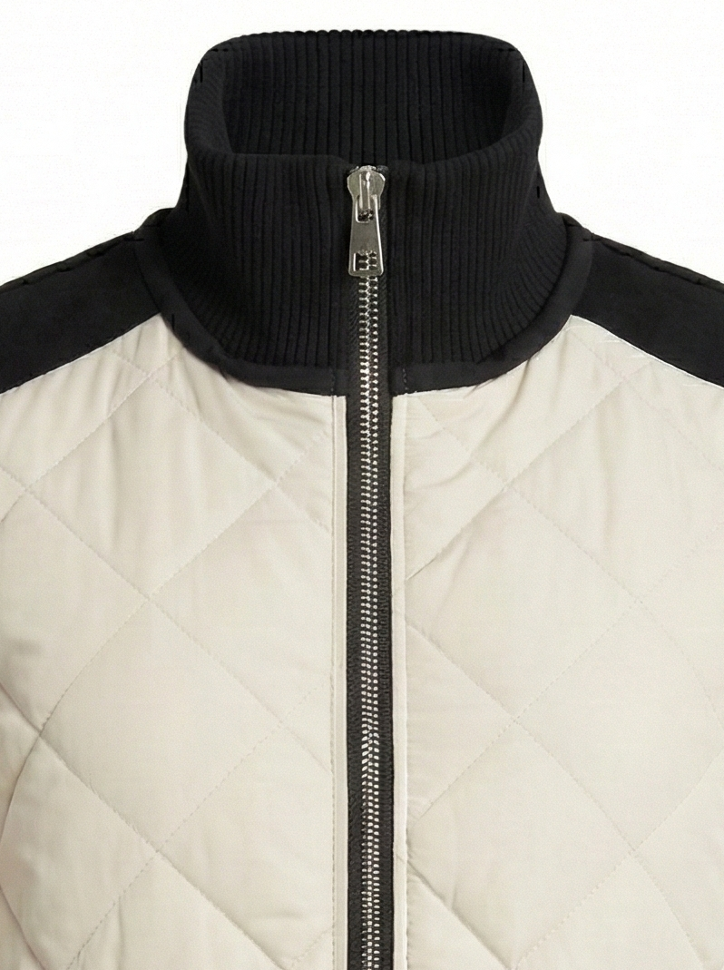 Adroit Atelier Destiny Sleeveless Quilted Vest With Zipper Detail in Birch available at Barbara Katz