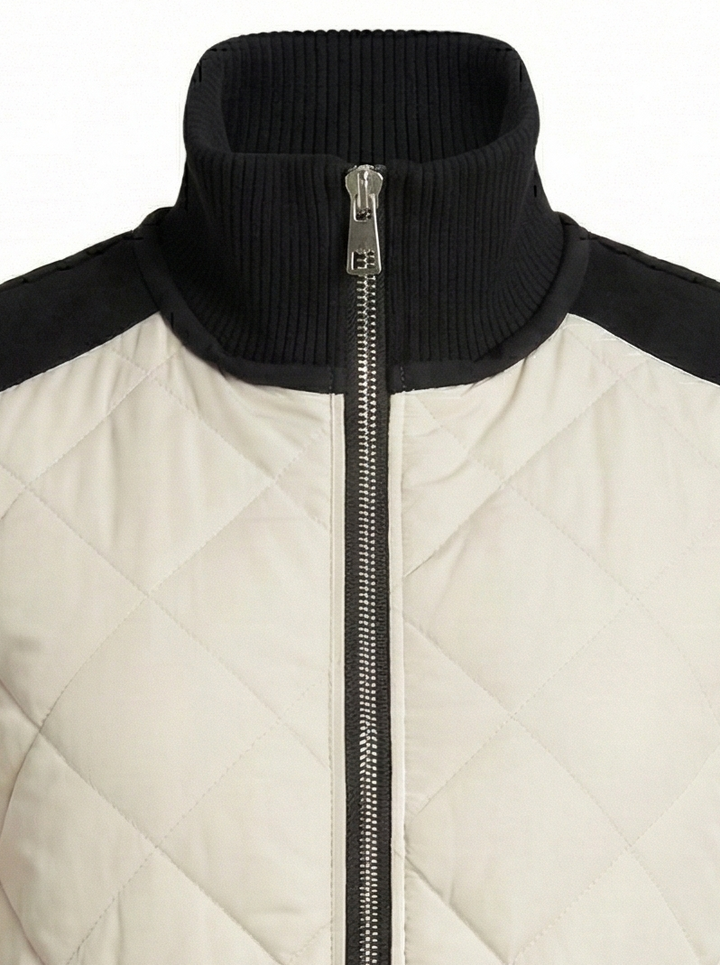 Adroit Atelier Destiny Sleeveless Quilted Vest With Zipper Detail in Birch available at Barbara Katz