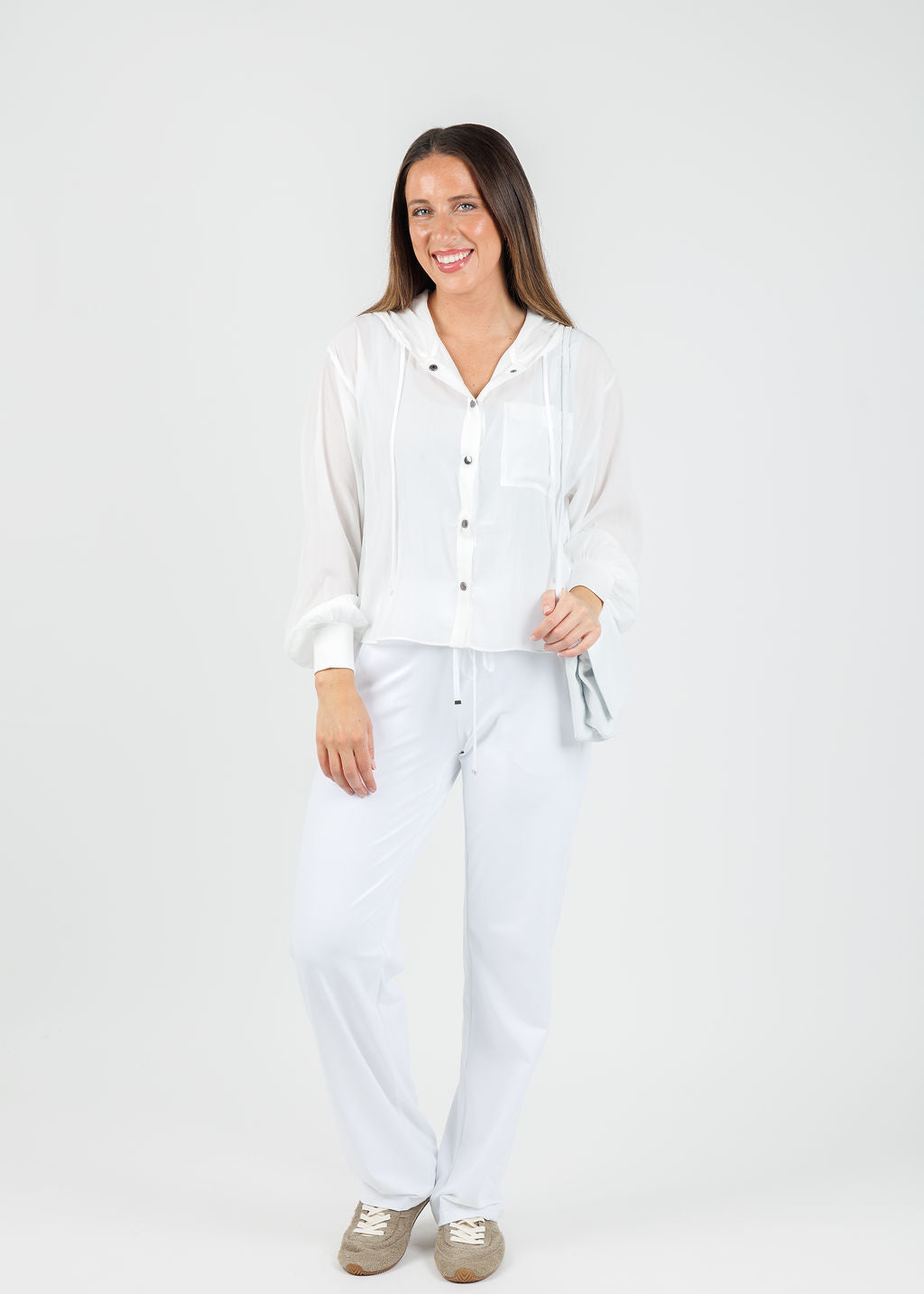 Lola & Sophie Astrid Hoodie Jacket With Pocket in White paired with Raffaello Rossi Candice Straight Pants in White available at Barbara Katz
