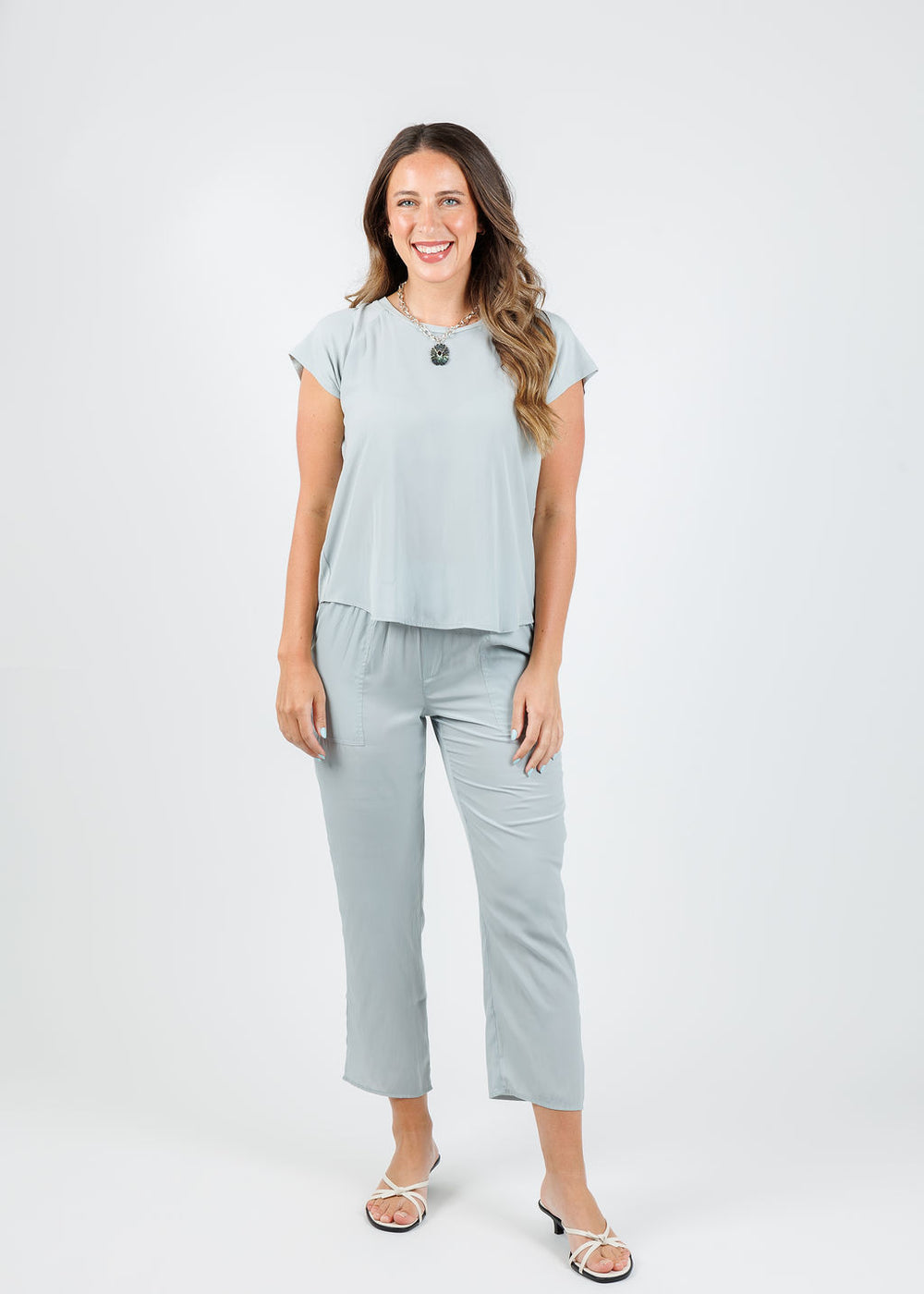Lola & Sophie Alondra Cap Sleeve Tee in Mineral paired with matching D Satin Crop Pants in Mineral available at Barbara Katz