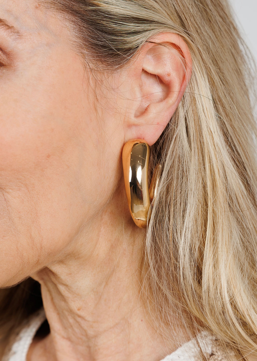 BK Jewelry Sari Gold Puffy Tapered Hoop Earrings available at Barbara Katz