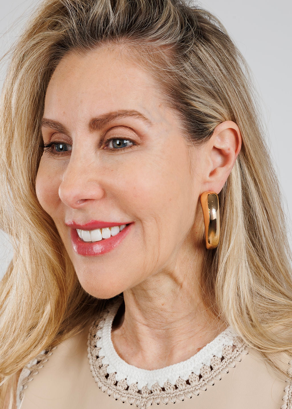 BK Jewelry Sari Gold Puffy Tapered Hoop Earrings available at Barbara Katz