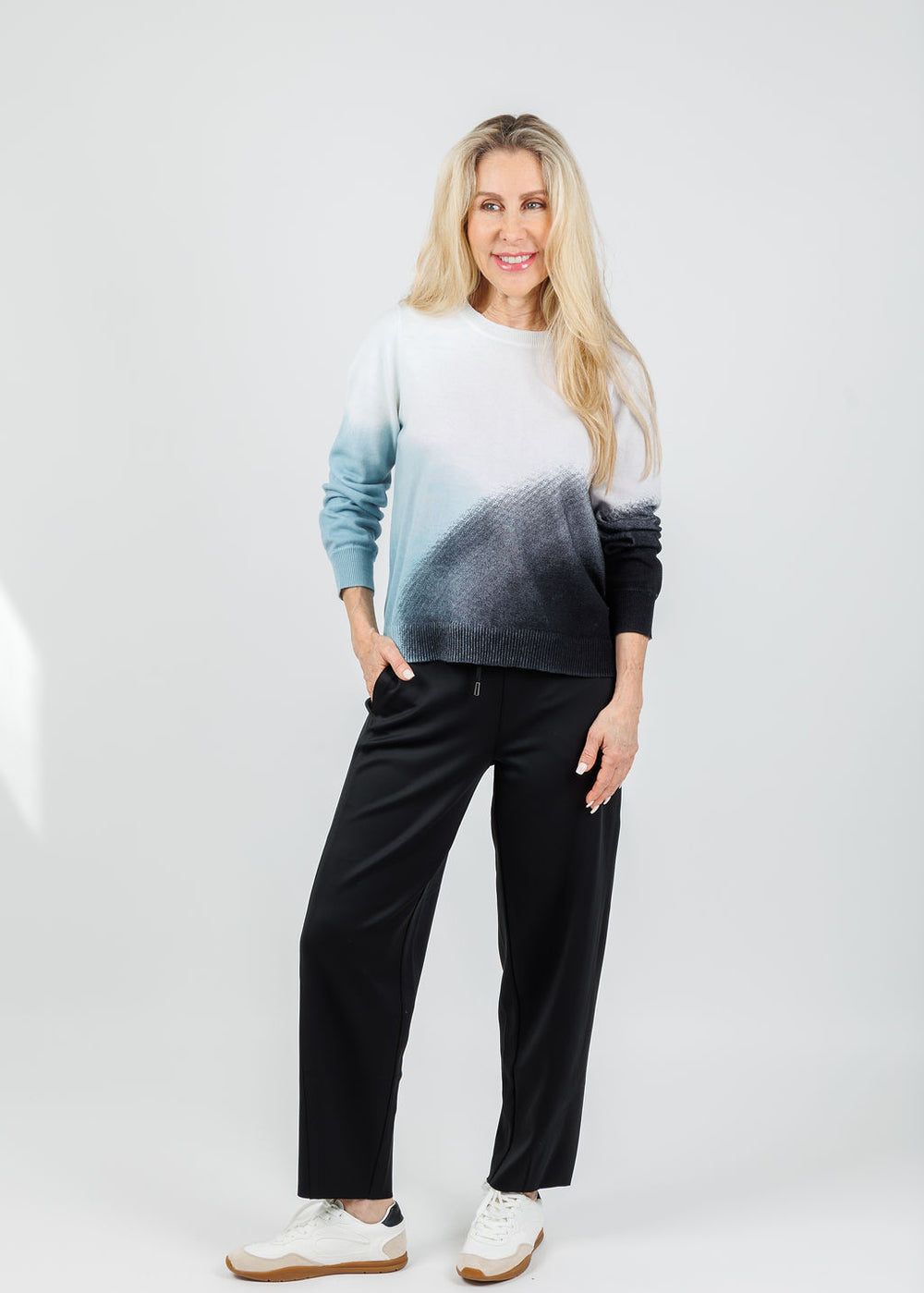 Lisa Todd Color Haze Sweater in Blue Combo paired with Lysse Desi Grommet Detail Neoprene Barrel Joggers in Black available at Barbara Katz