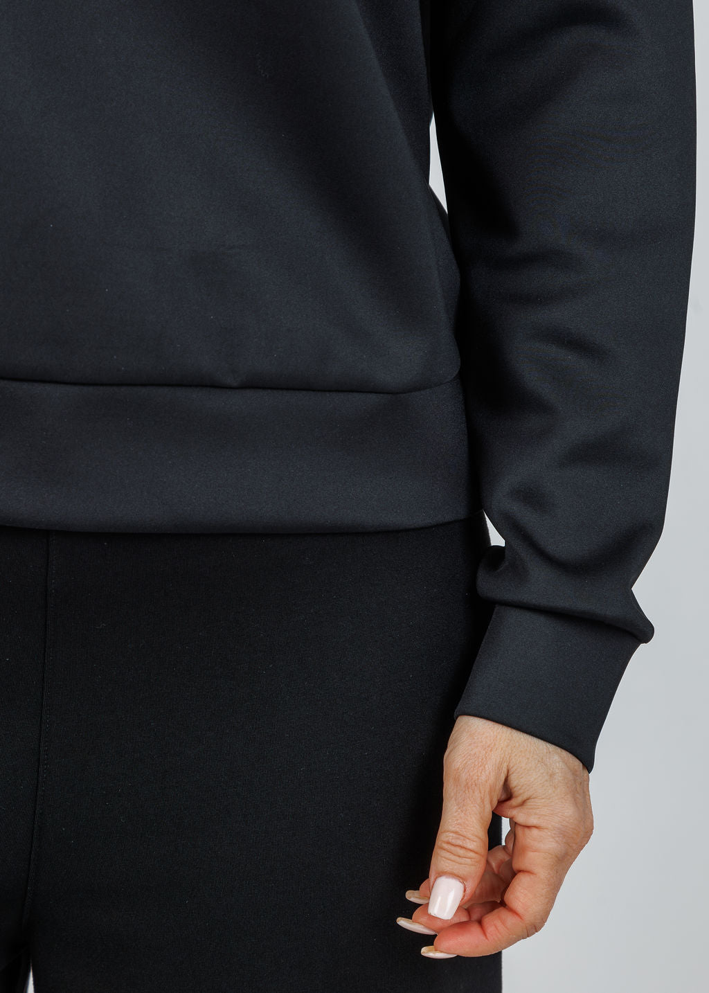 Lysse Desi Grommet Detail Neoprene Pullover in Black available at Barbara Katz