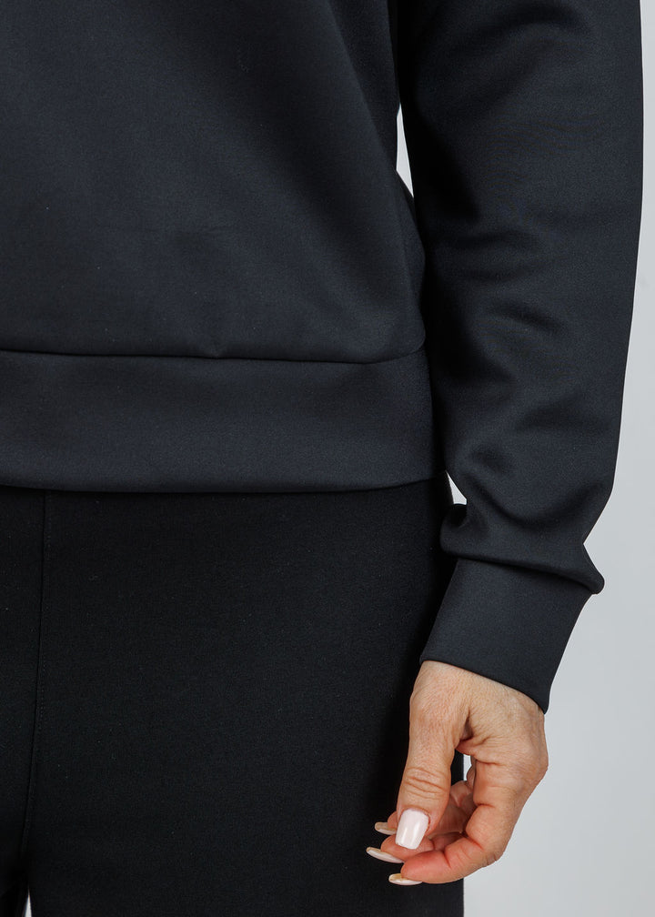 Lysse Desi Grommet Detail Neoprene Pullover in Black available at Barbara Katz