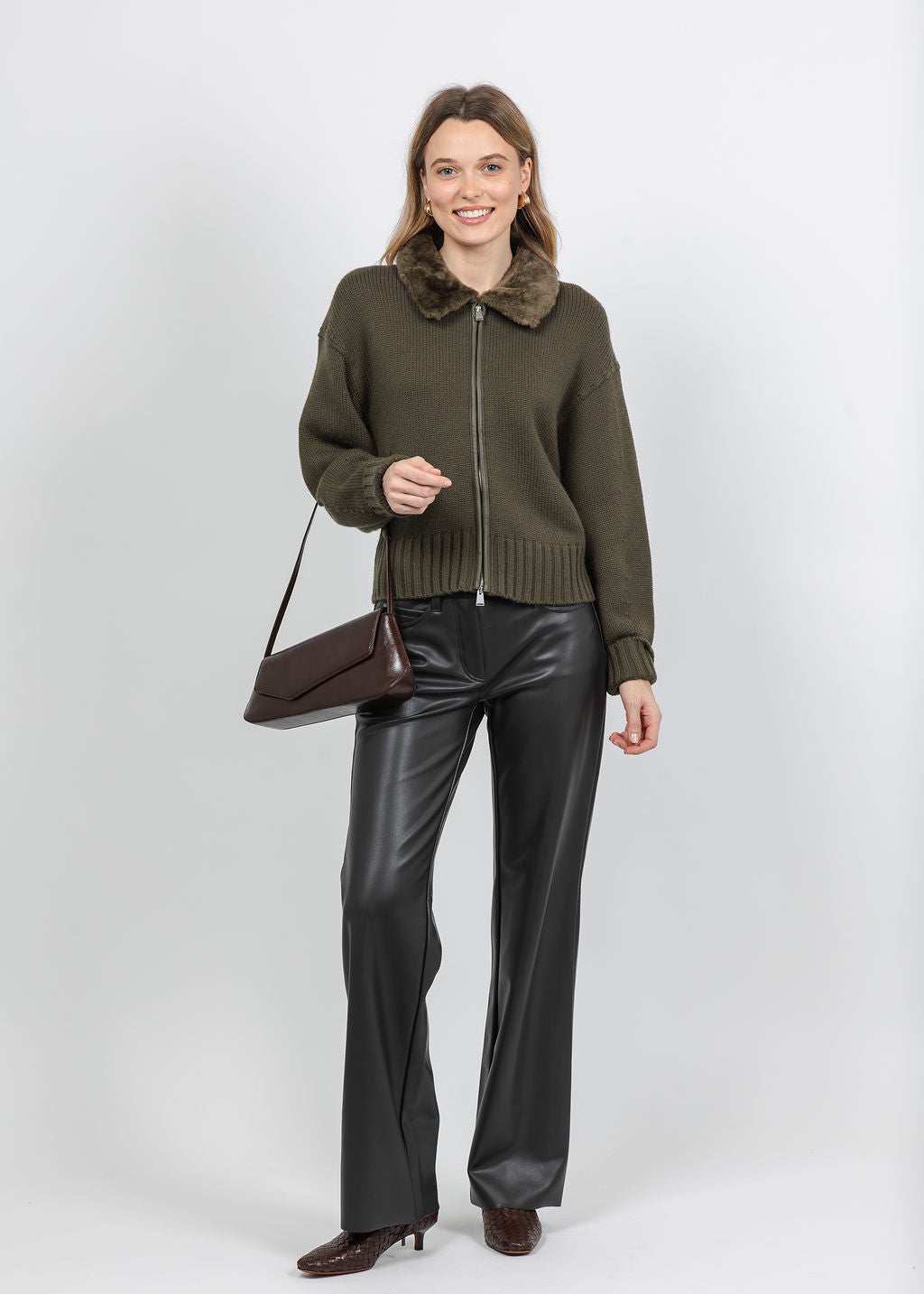 Simkhai Zorina Cardigan in Dark Olive paired with MAC 32" Wide Vegan Leather Pant in Brown available at Barbara Katz