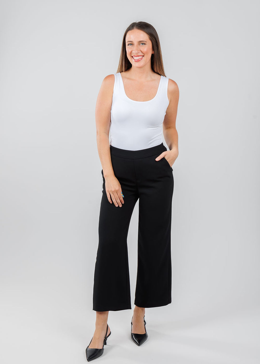 A'nue The Classic Micro Tank Top in White paired with MAC Chiara Crop Floating Crepe Pants in Black available at Barbara Katz