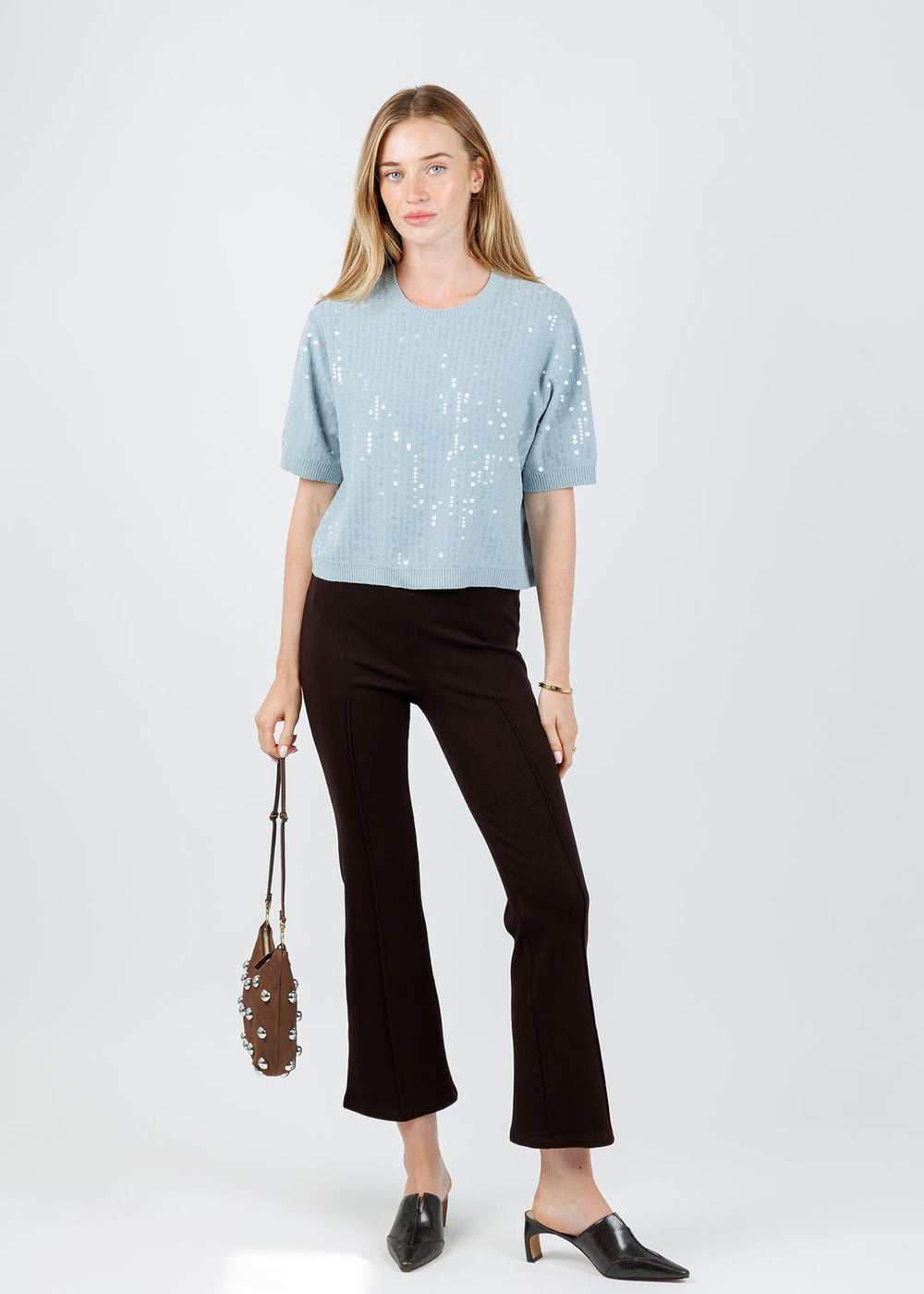 Marella Depend Sequin Tee in Water paired with Donni The Rib Kick Flare Trousers in Espresso available at Barbara Katz