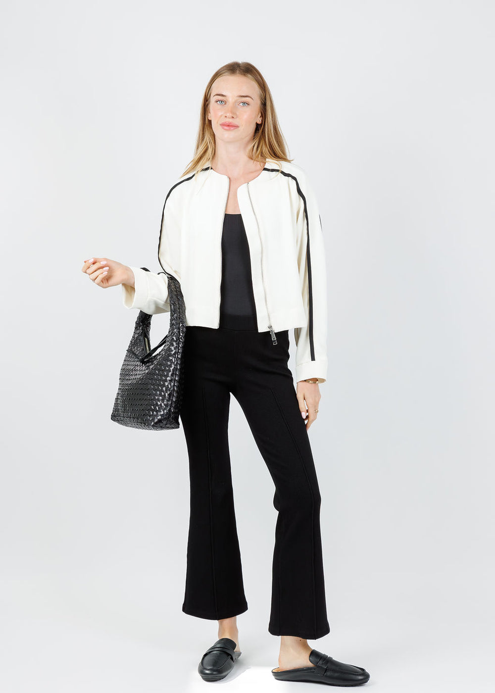 Marella Libage Satin Bomber Jacket in Wool White paired with Donni The Rib Flared Pants in Jet available at Barbara Katz