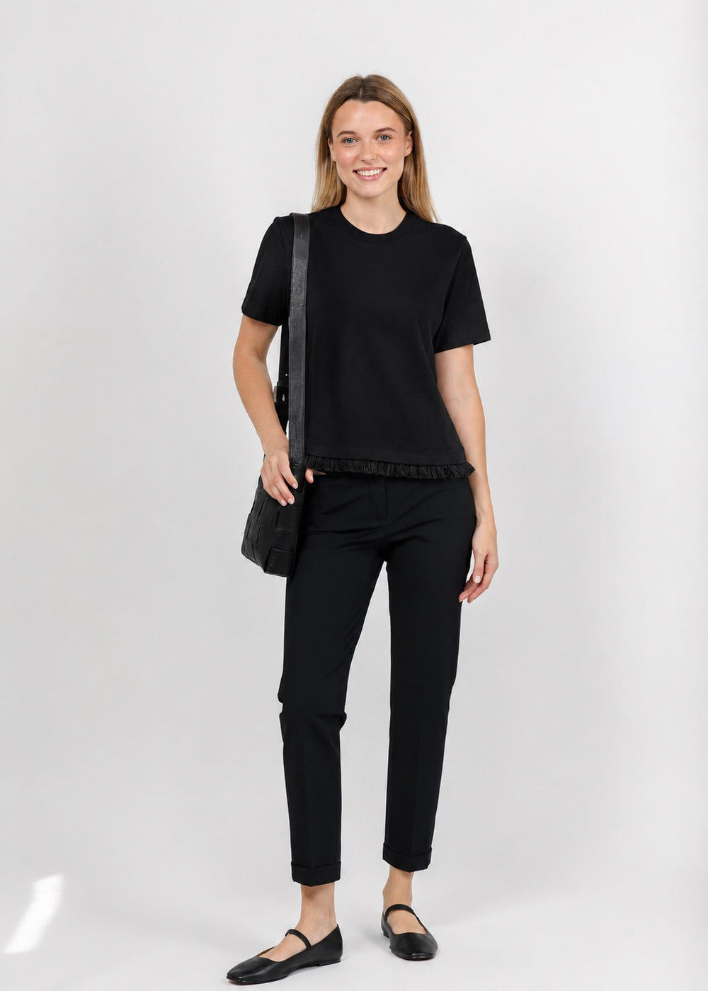 Margittes Fringe Hem Short Sleeve Tee in Black available at Barbara Katz