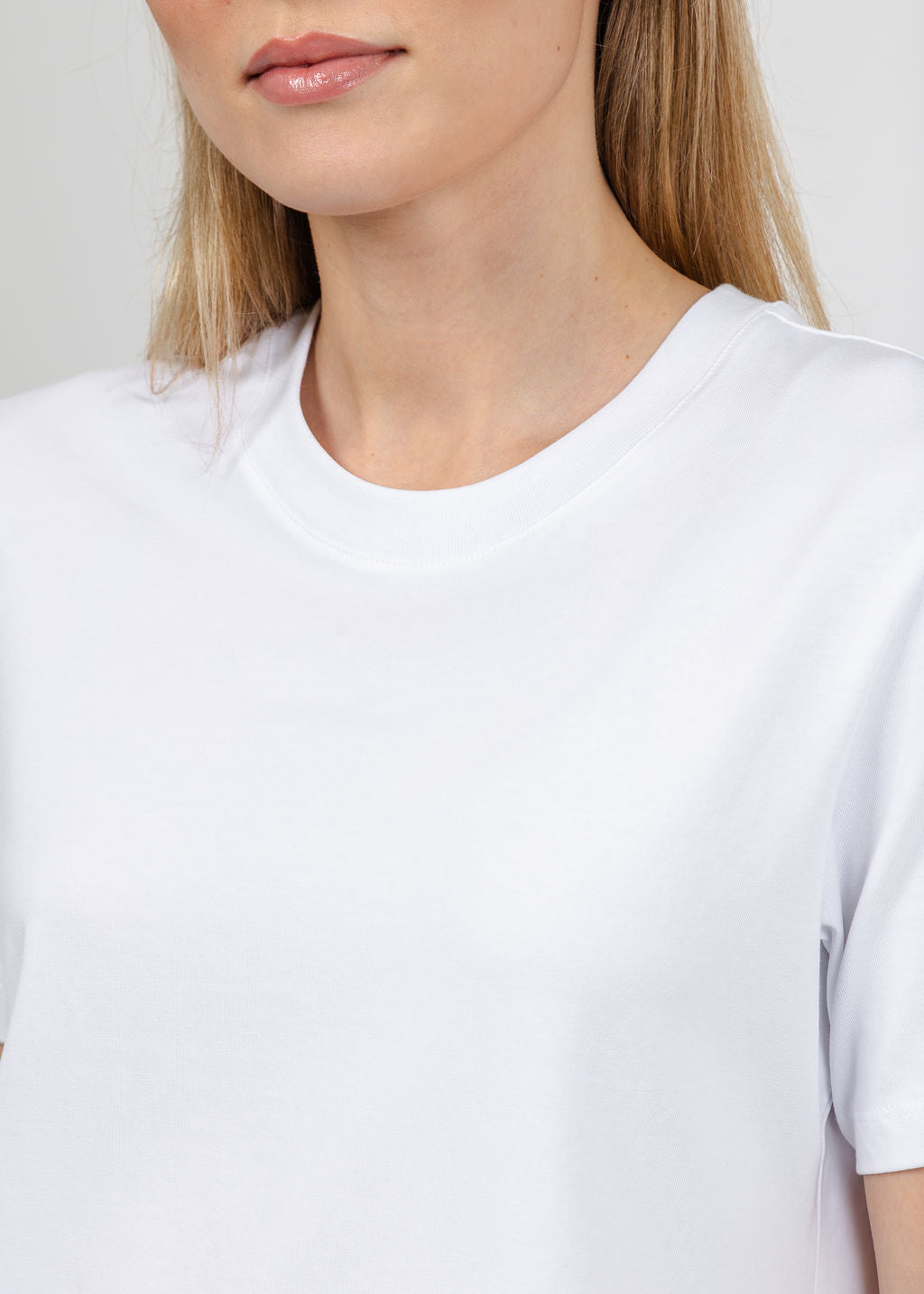 Margittes Fringe Hem Short Sleeve Tee in White available at Barbara Katz