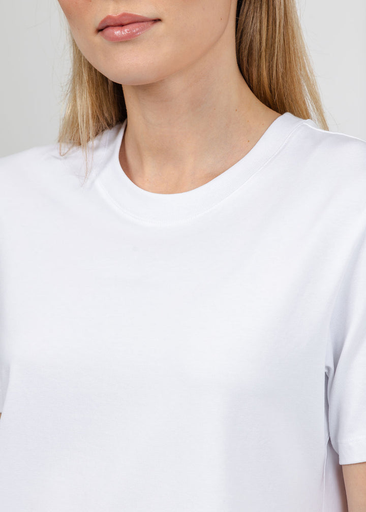 Margittes Fringe Hem Short Sleeve Tee in White available at Barbara Katz