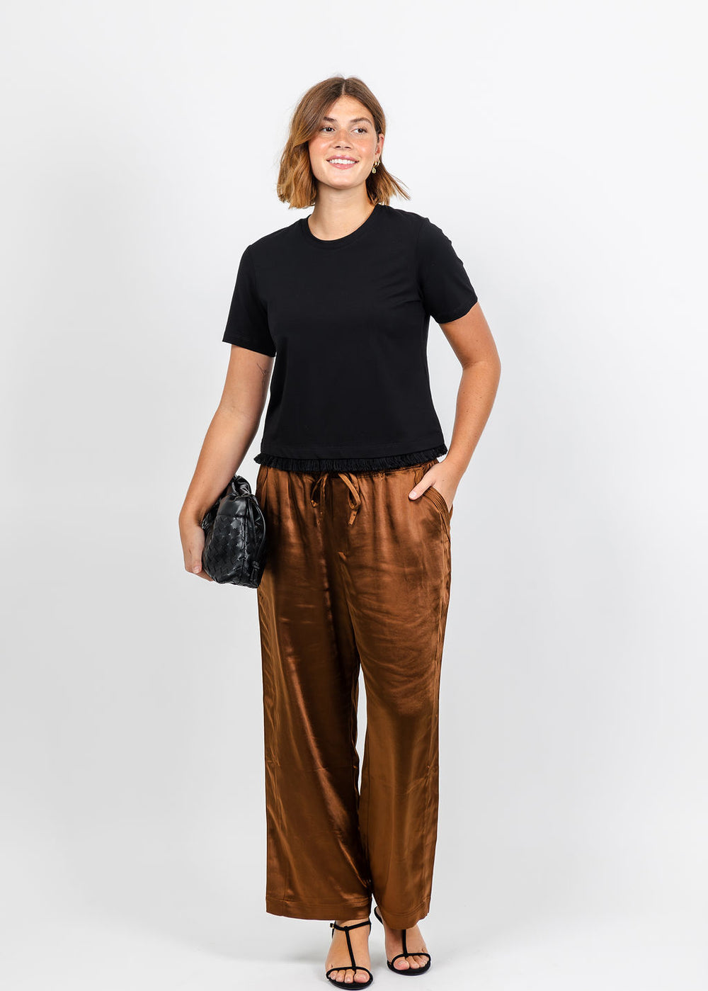 Margittes Fringe Hem Short Sleeve Tee in Black paired with Melissa Nepton Colette Pants in Chestnut available at Barbara Katz