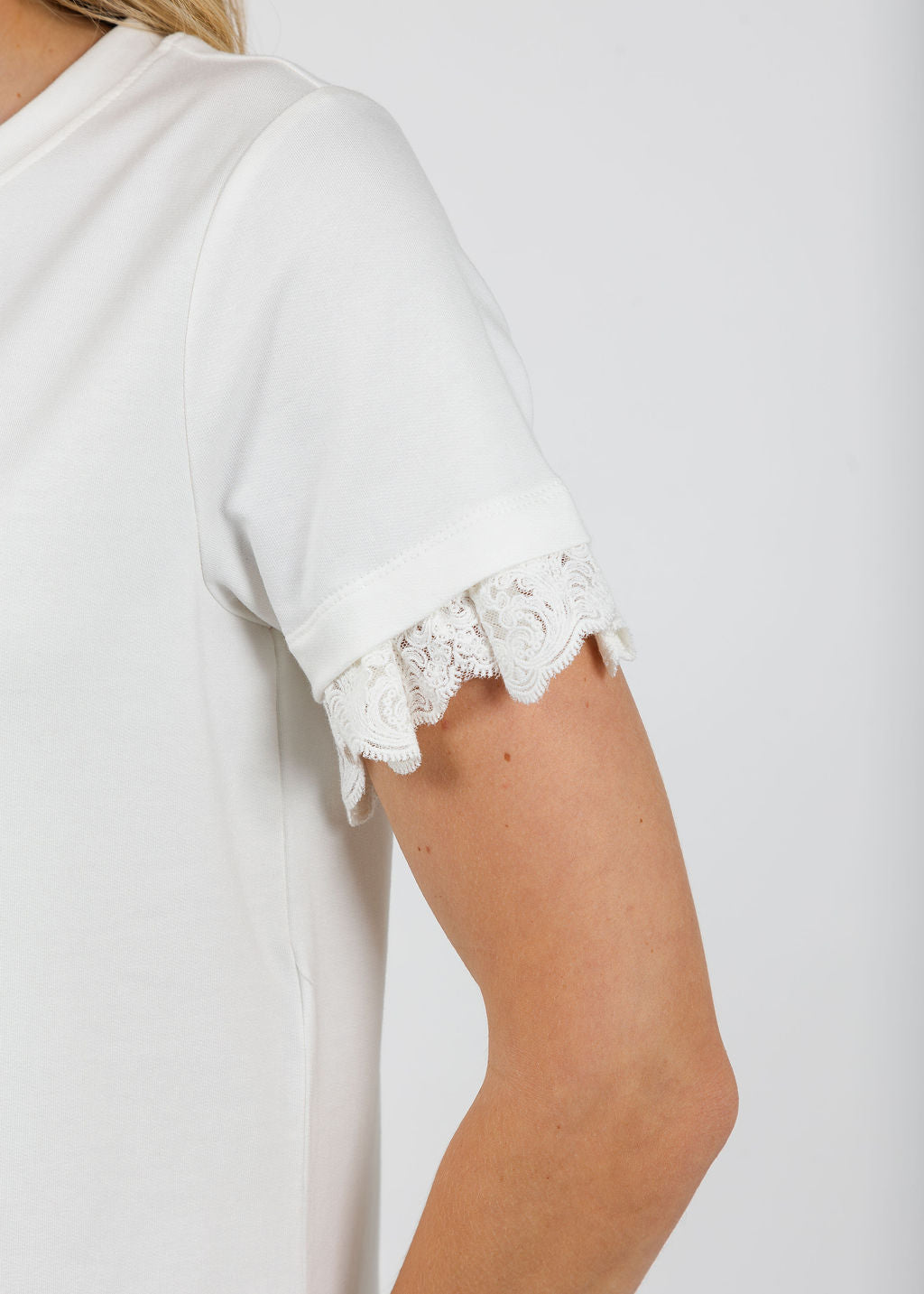 Margittes Lace Trim Crew Neck Tee in Off White available at Barbara Katz