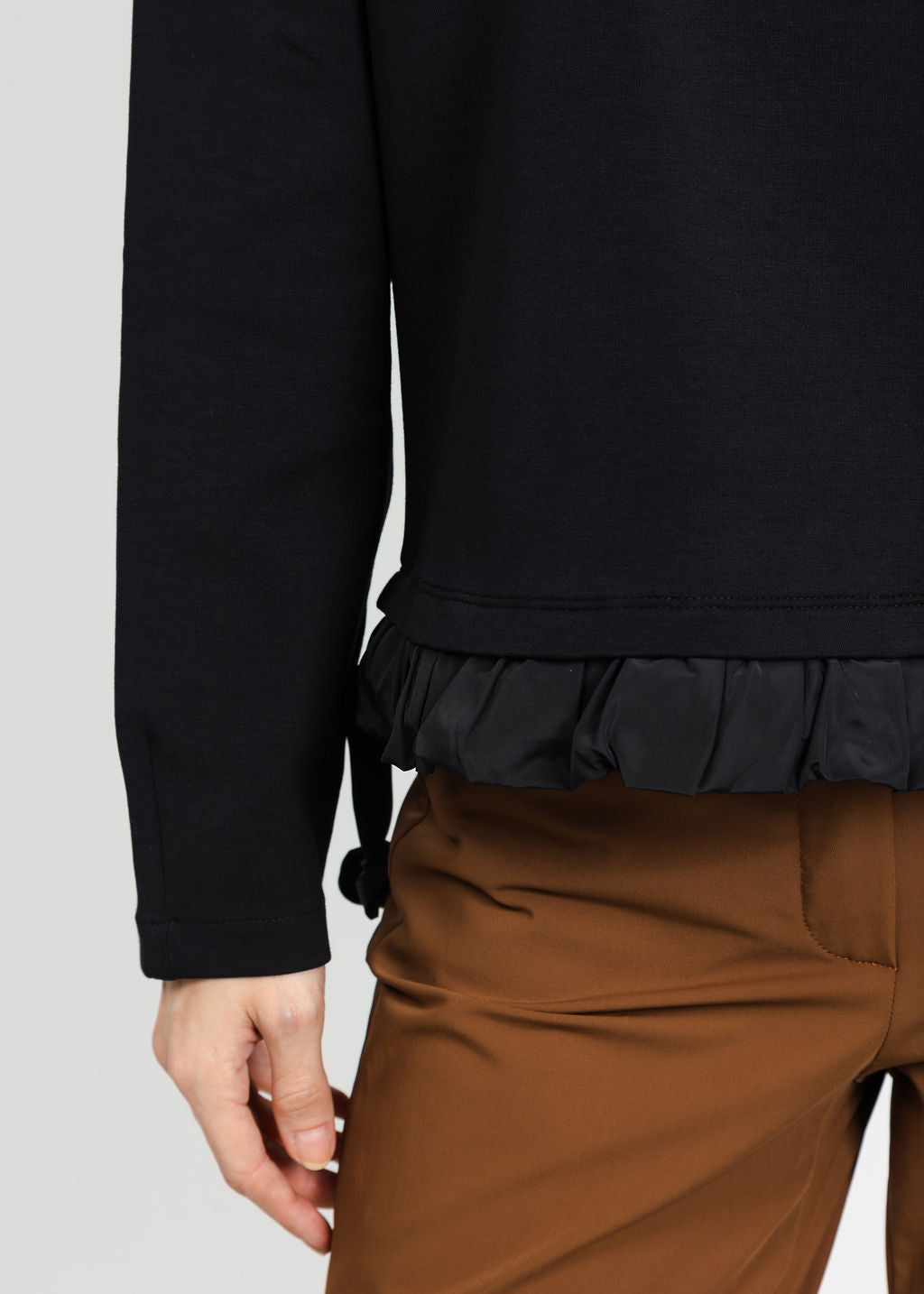 Margittes Ruffled Bottom Sweatshirt in Black available at Barbara Katz