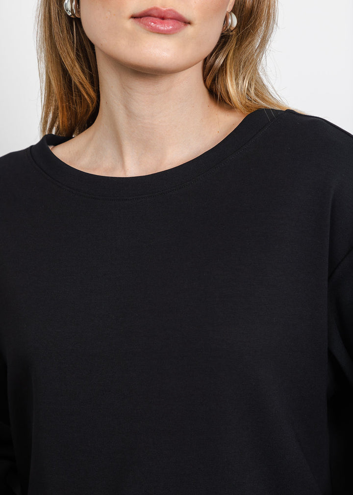 Margittes Ruffled Bottom Sweatshirt in Black available at Barbara Katz