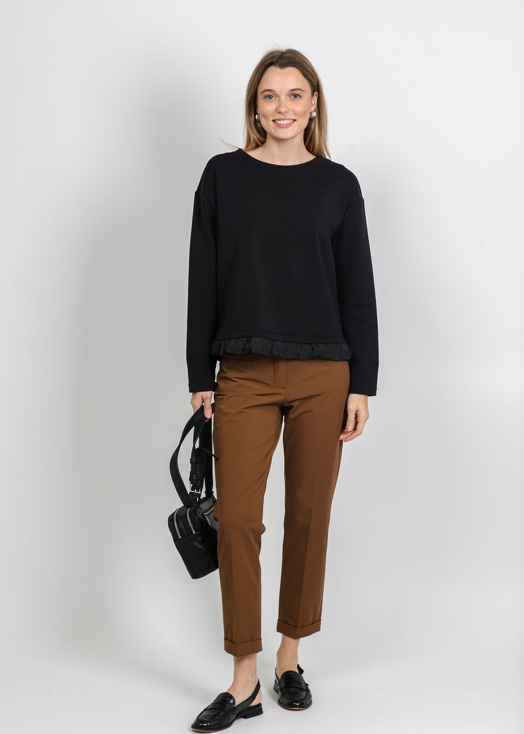 Margittes Ruffled Bottom Sweatshirt in Black available at Barbara Katz