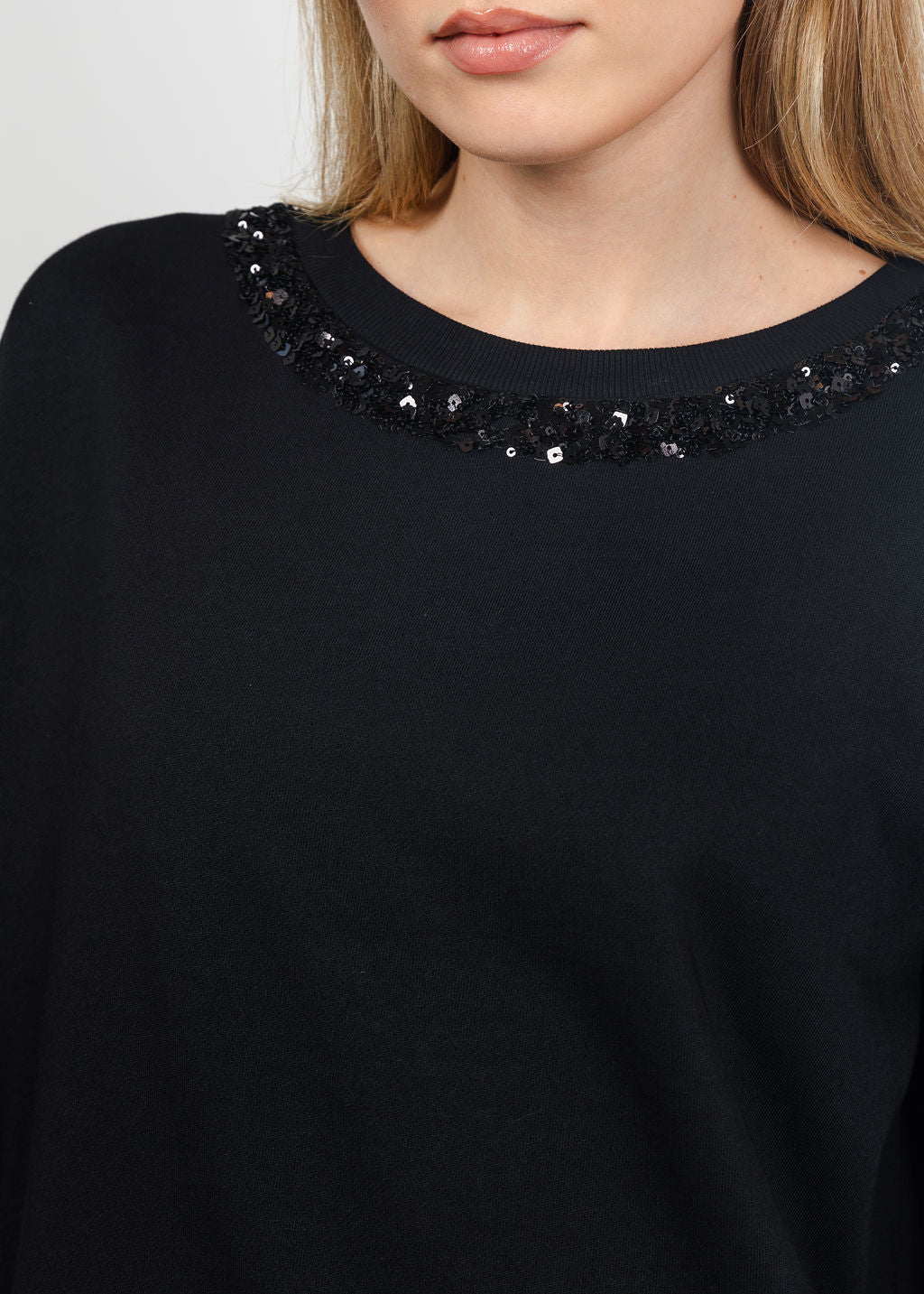 Margittes Sequin Trim Sweatshirt in Black available at Barbara Katz