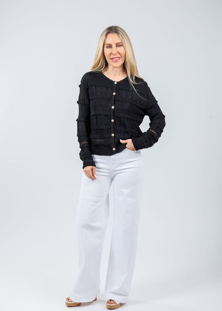 Maria Pavan Ross Fringe Cardigan in Black paired with Frame Le Slim Palazzo Jeans in White available at Barbara Katz