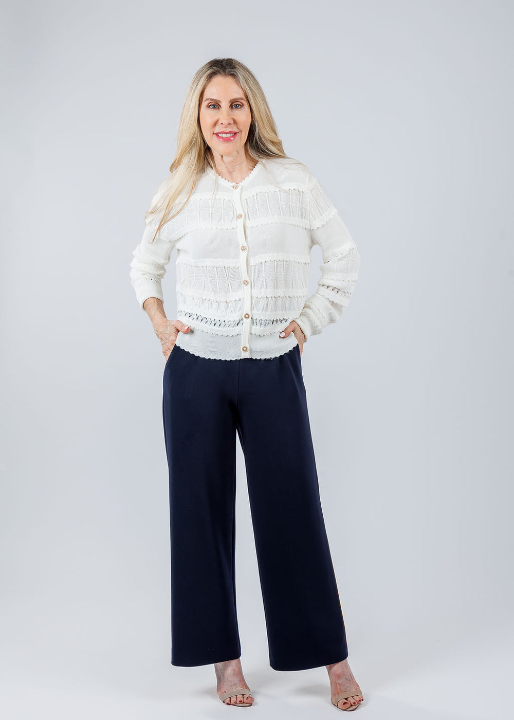 Maria Pavan Ross Fringe Cardigan in Off White  paired with Raffaello Rossi Sally 7/8 High Tech Jersey Pants in Black available at Barbara Katz