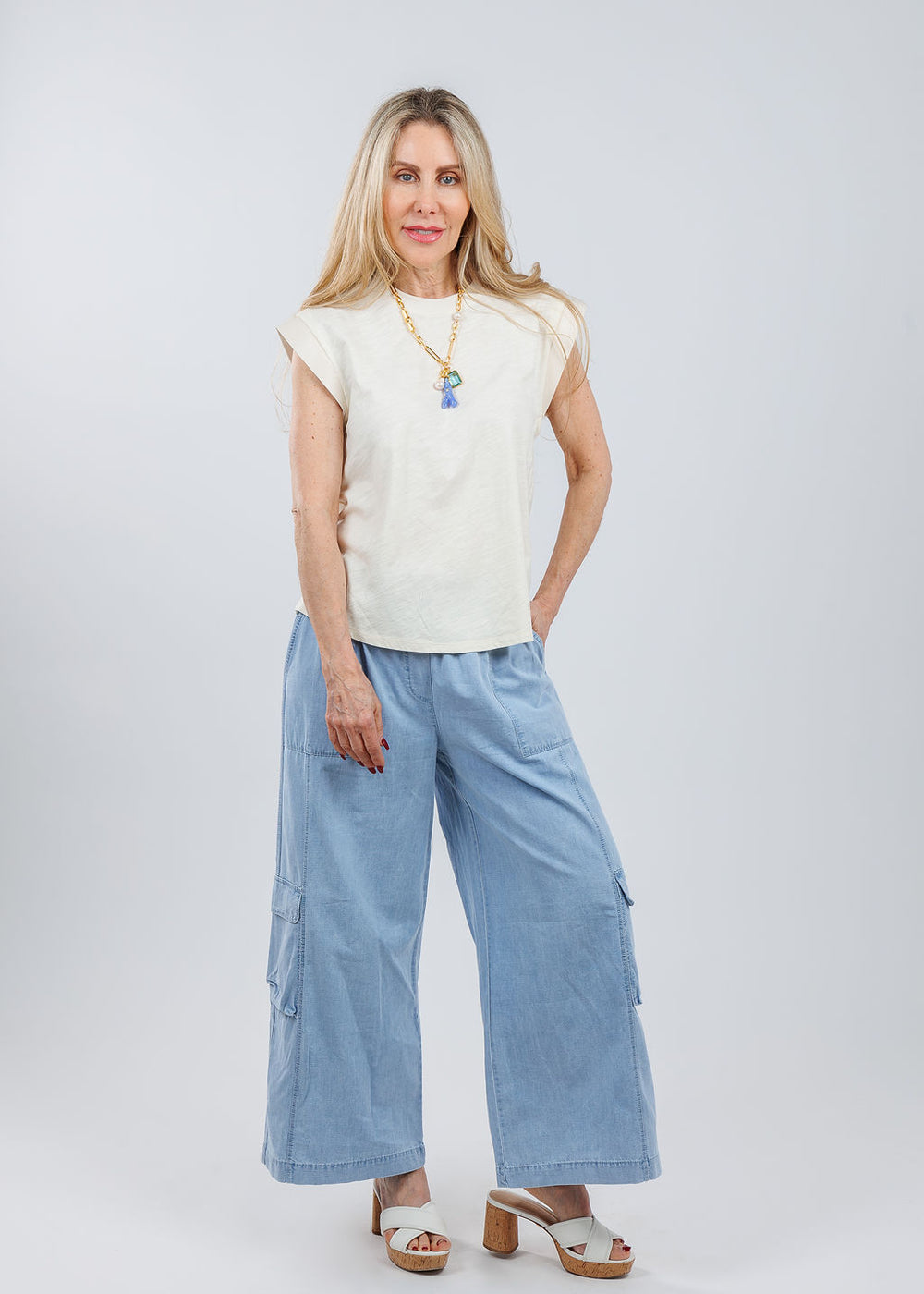 Melissa Nepton Francesca Muscle Tank Top in Cream paired with Melissa Nepton Silvestre Pants in Medium Blue, Lizzie Fortunato Pacific Reef Necklace available at Barbara Katz