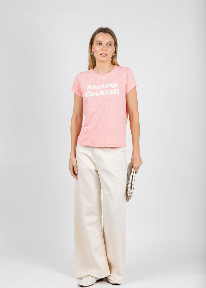 Mother The Boxy Goodie Goodie Tee in Shrimp Cocktail paired with Mother The Lil Lemon Twist Sneak Jeans in Natural available at Barbara Katz