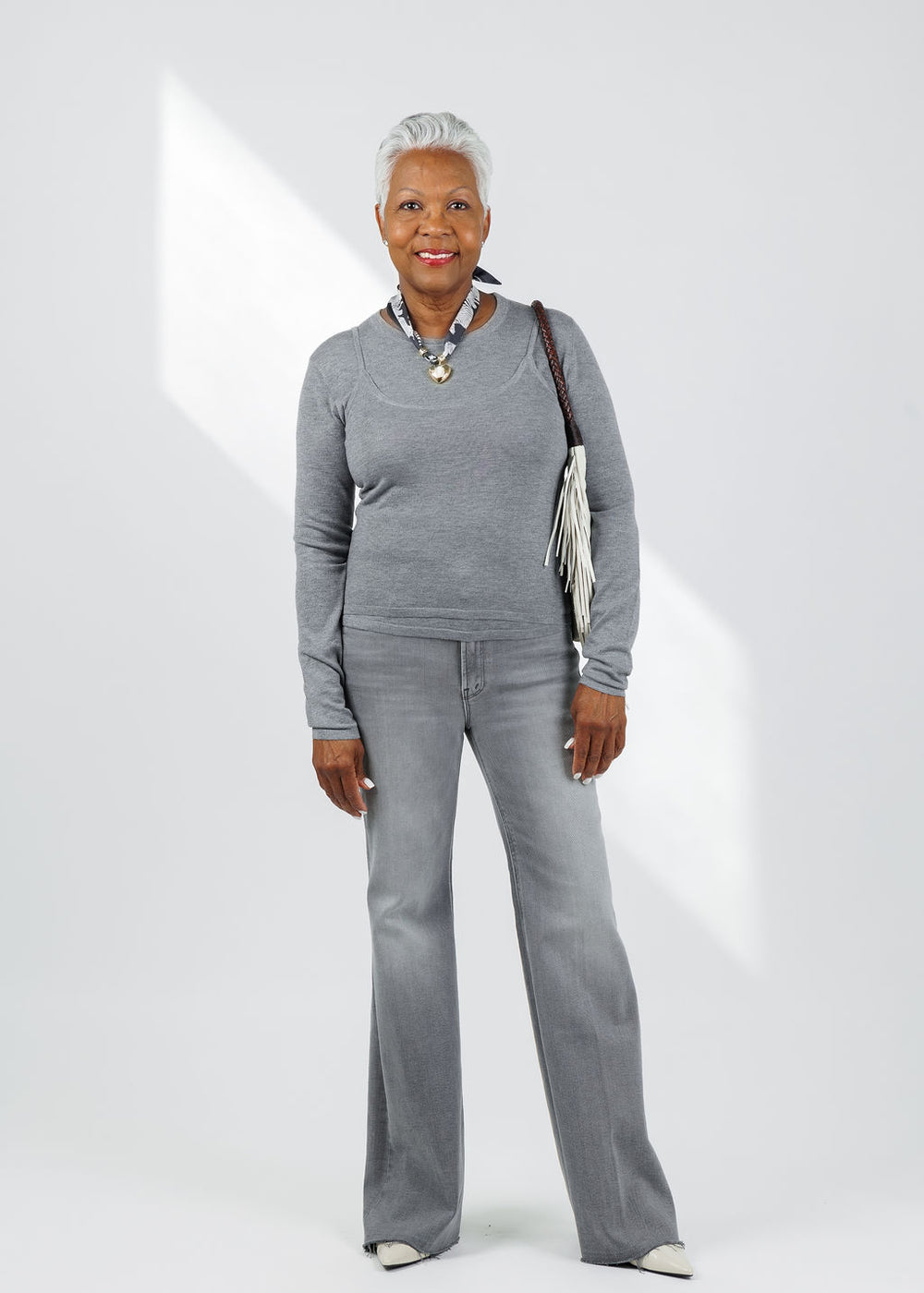 Suncoo Prava Thin Layered Pullover Sweater in Gris Chine paired with Mother The Doozy Sneak Fray Jeans in Catch Me Outside available at Barbara Katz