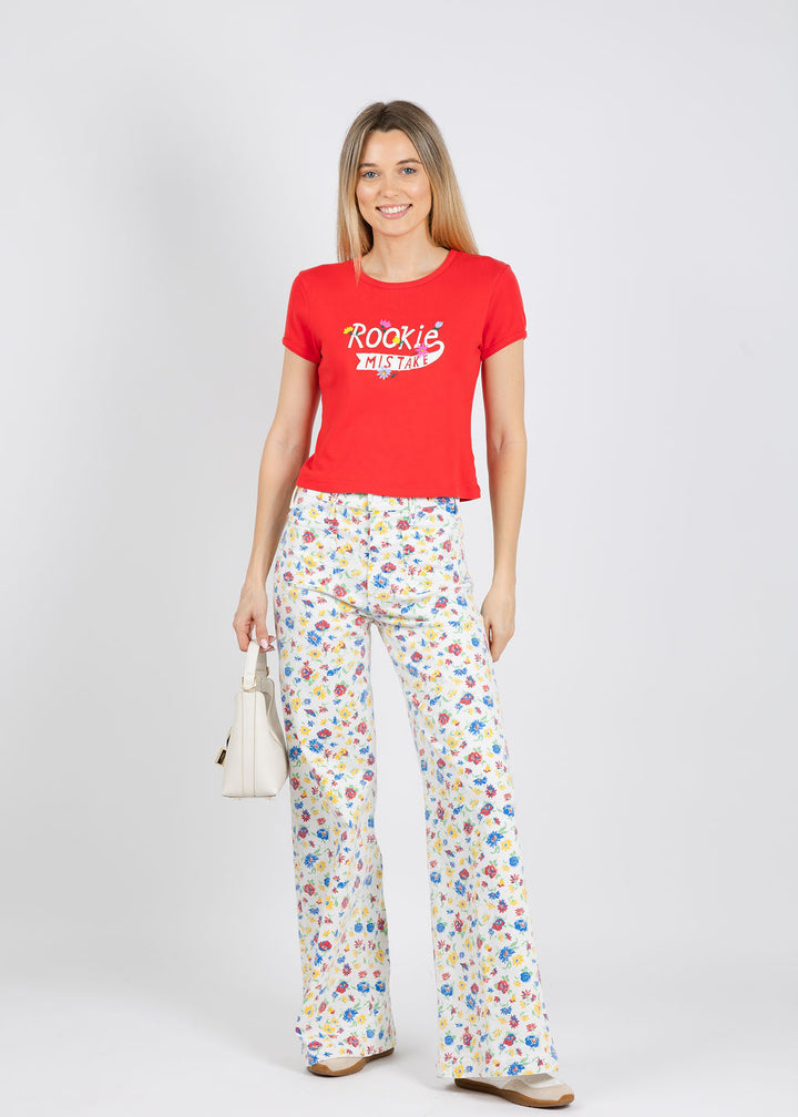 Mother The Itty Bitty Ringer Tee in Rookie Mistake paired with Mother Hustler Roller Patch Pocket Sneak Jeans in Rose Bowl available at Barbara Katz