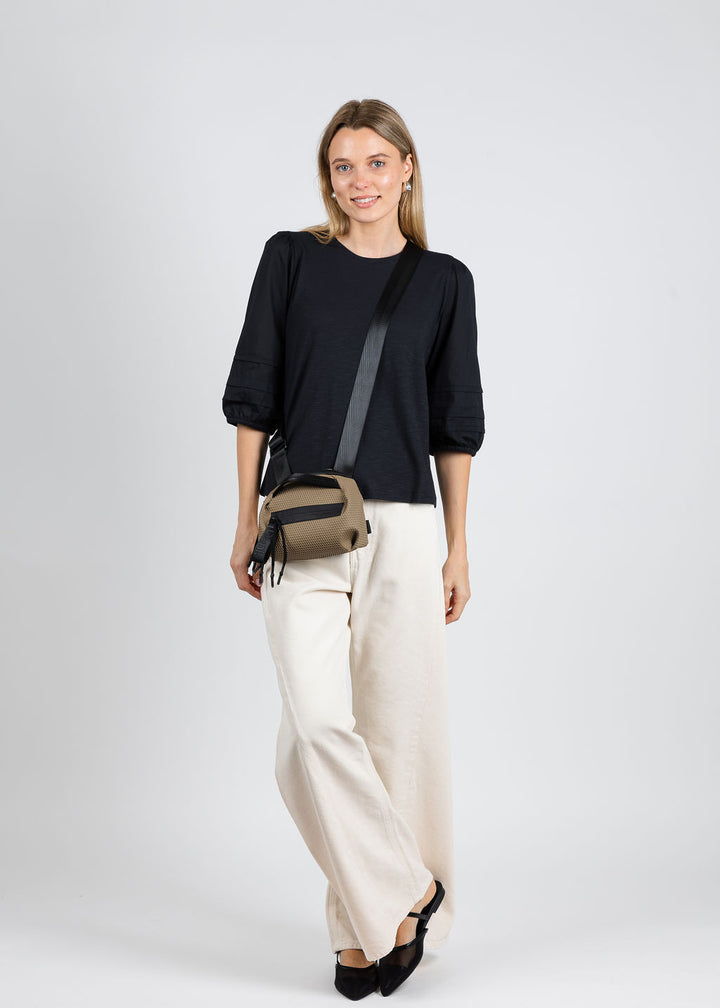 Elliott Lauren Balloon Sleeve Combo Top in Black paired with Mother The Lil Lemon Twist Sneak Jeans in Natural available at Barbara Katz