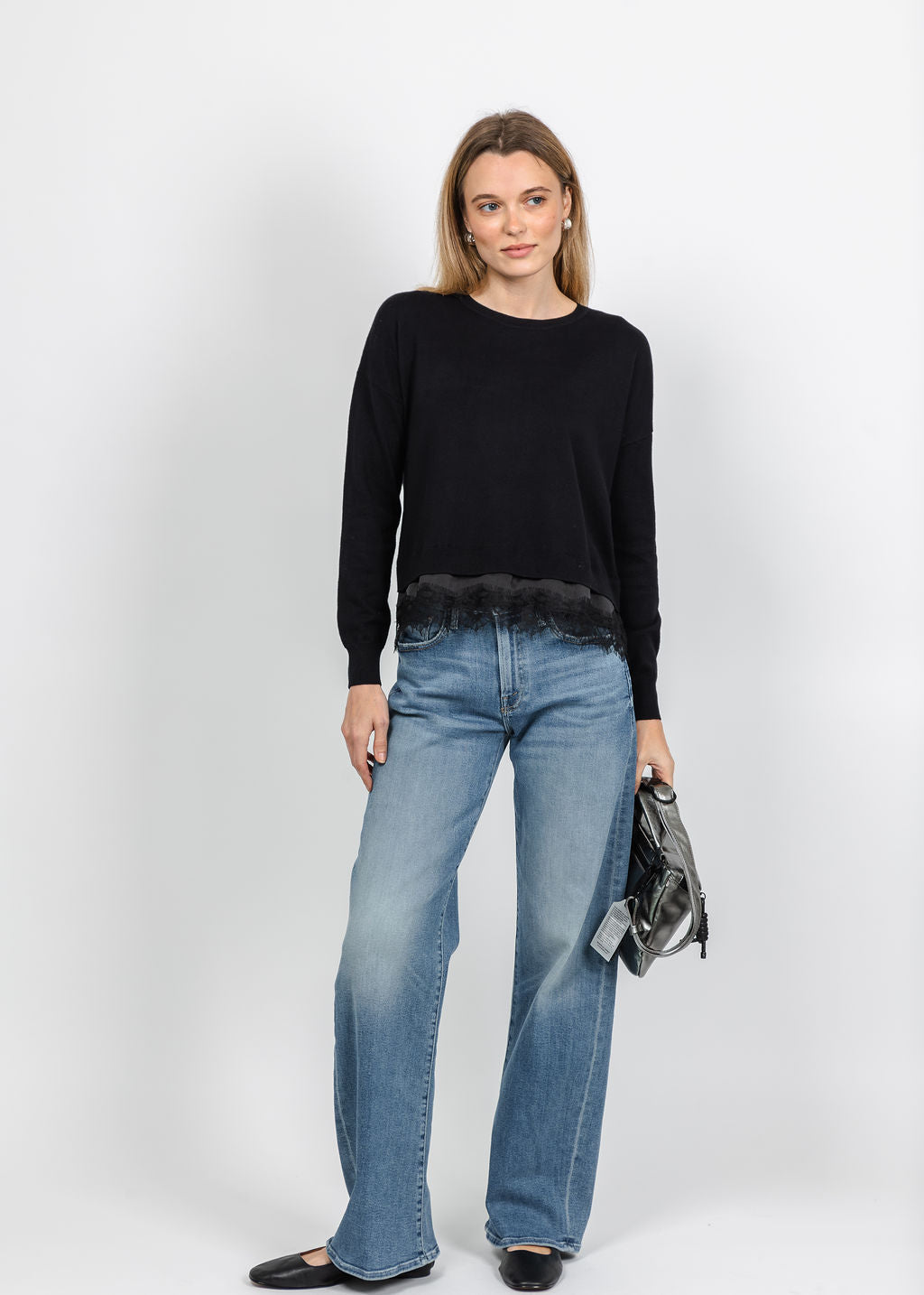 J Society Lace Trim Crew Sweater in Black paired with Mother The Mid Rise Lasso Sneak Jeans in VGR available at Barbara Katz