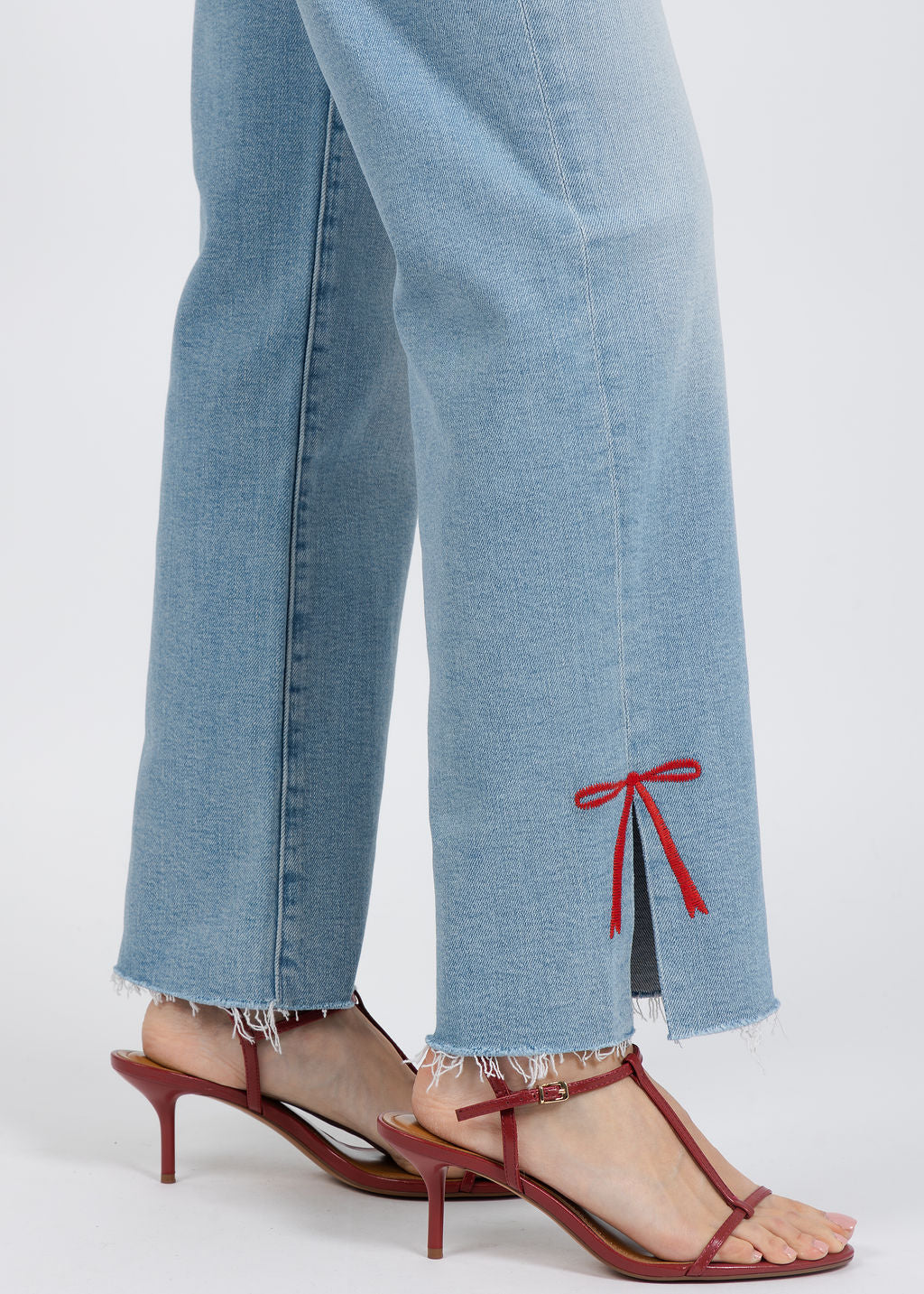 Mother The Rambler Zip Slice Hover Fray Jeans in Complete 360 available at Barbara Katz