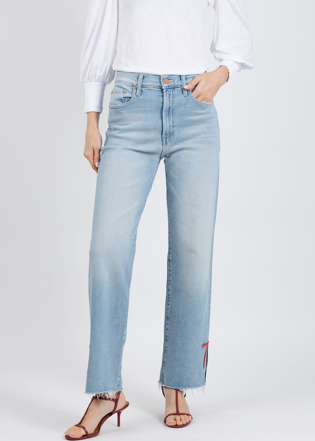 Mother The Rambler Zip Slice Hover Fray Jeans in Complete 360 available at Barbara Katz