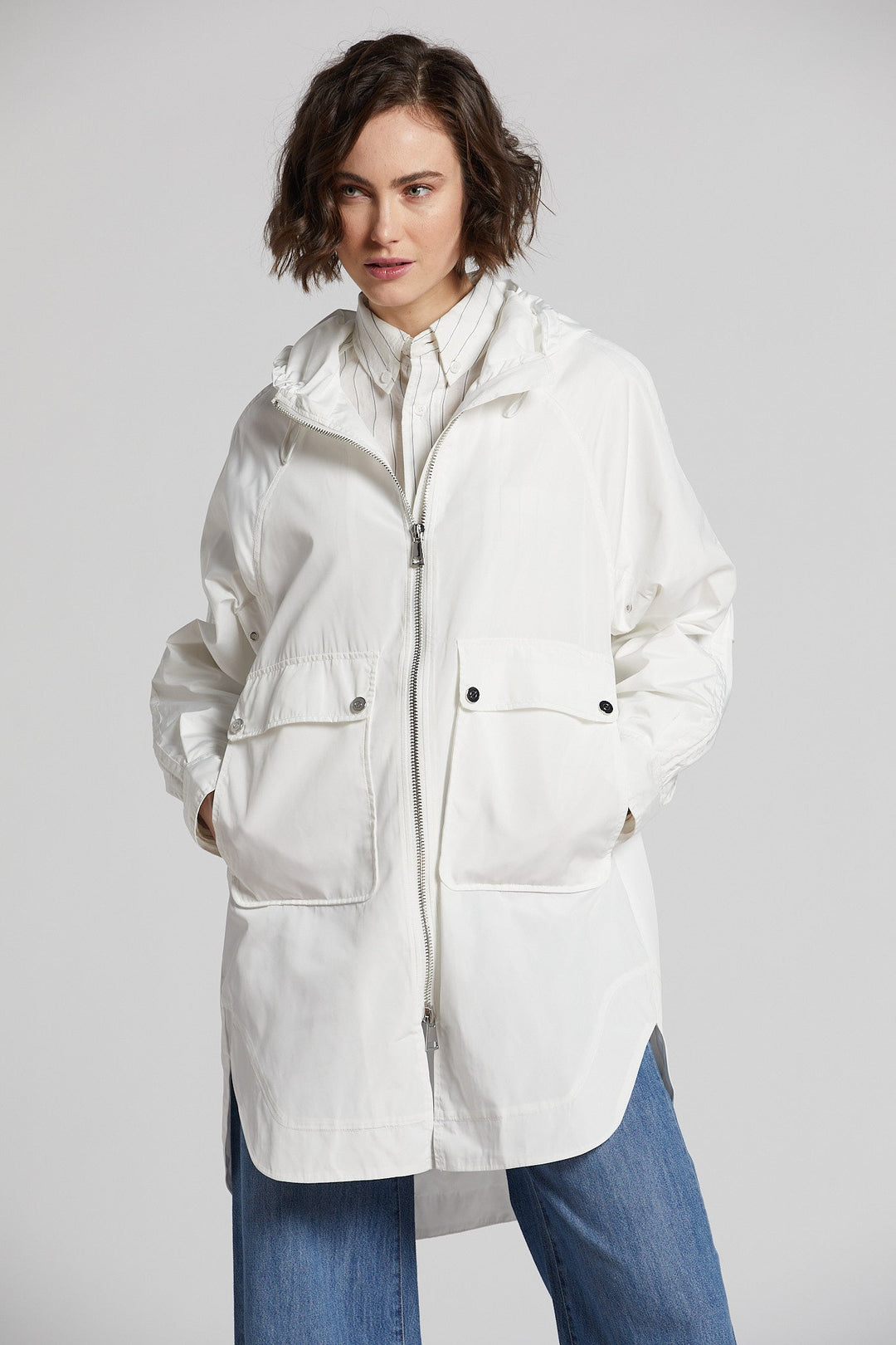 Adroit Atelier's Nikita Lightweight Hooded Raincoat in White