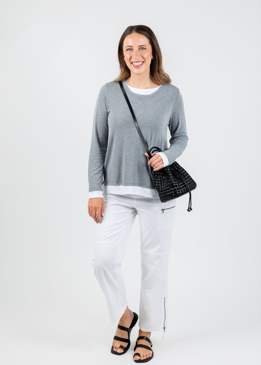 Nally & Millie Lucy Long Sleeve Layered Tee in Grey paired with Marrakech Cyprus Pants in White, Remi/Reid Perrie Mini Bucket Bag in Black available at Barbara Katz
