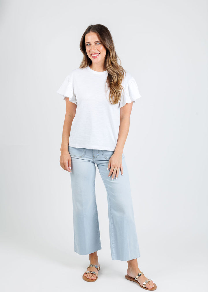 Nation Los Angeles Camille Ruffle Sleeve Top in Optic White paired with Frame The Anchor Pants in Float Raw Fray available at Barbara Katz