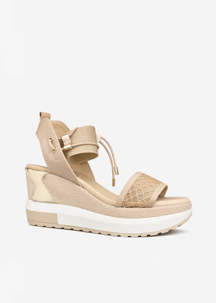 Nero Giardini Sabina Bungee Mesh Platform Wedge Sandals in Nude/Gold available at Barbara Katz